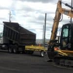Heavy excavating equipment at Morris Trucking Excavating Simcoe site